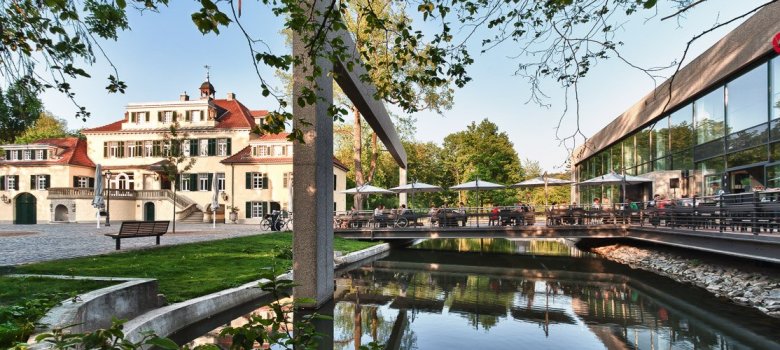Das Bild zeigt Schloss Eulenbroich und die angrenzende Bildungswerkstatt.