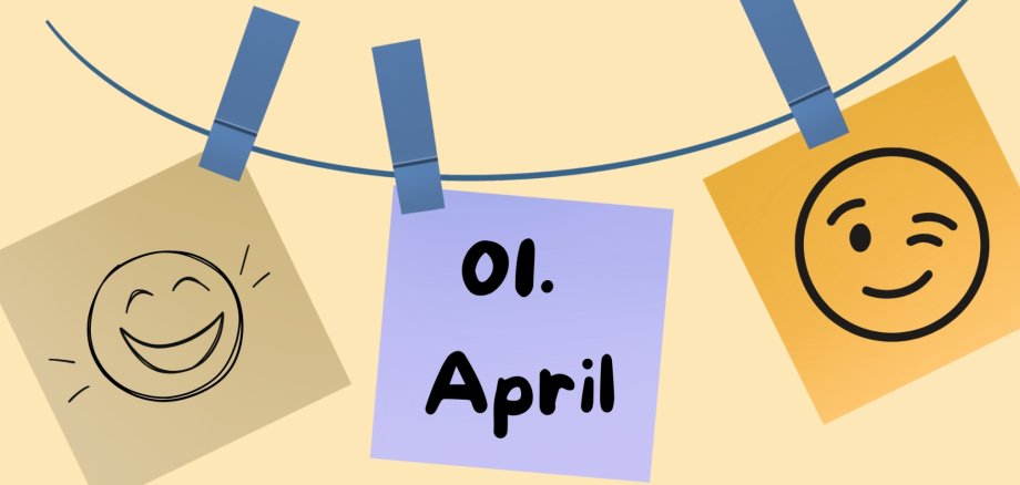 Das Bild macht auf einen Aprilscherz aufmerksam und zeigt Zettel an einer Wäscheleine mit lachenden Smileys.